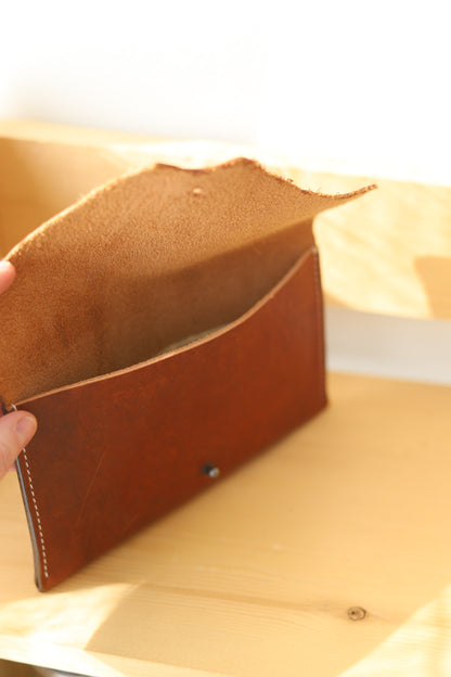 Essentials Raw Edge Leather Clutch